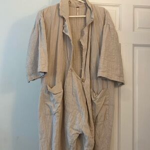 Free people cream colored jumpsuit.